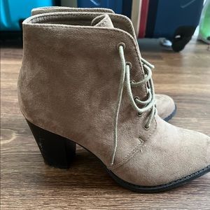 Women’s brown lace boots.